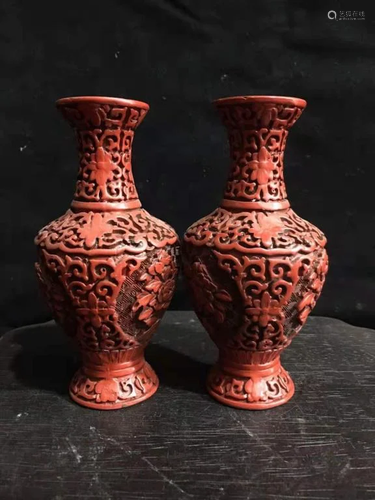 Pair of Carved Red Lacquer Vases