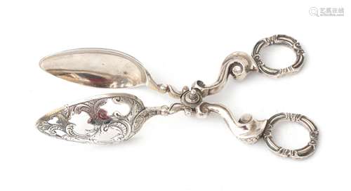 A 925 silver pair of pierced egg tongs with engraved decorat...