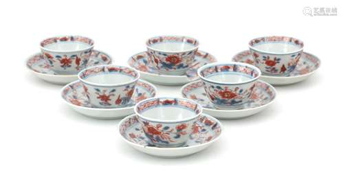 Six Chinese porcelain cups and saucers with Imari decoration...