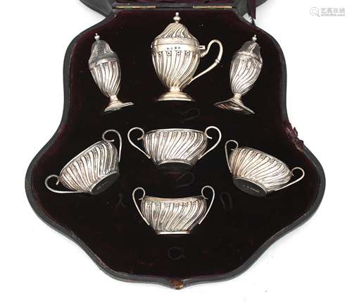 A 925 silver set of four salt cellars, two casters and a mus...