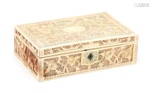 A carved ivory box with stylized floral motifs and birds, Ca...