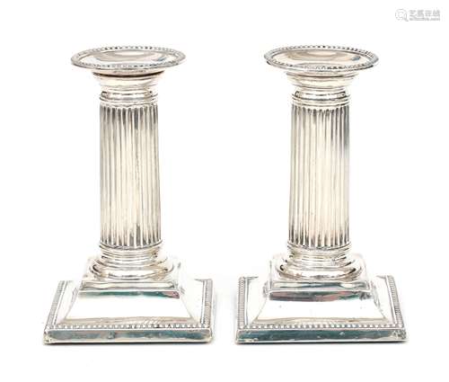 A pair of 925 silver column-shaped candelabras, London, 1894...