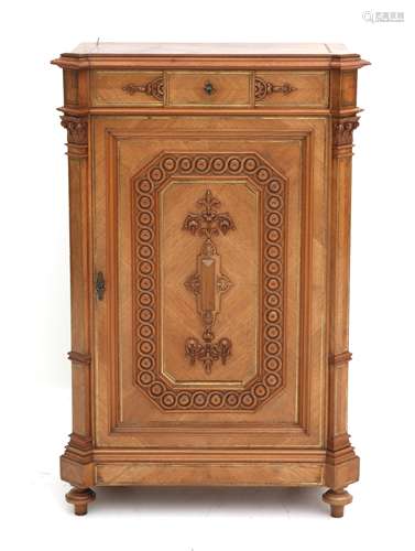 A walnut veneered cabinet in historizicing style, marked: Ho...