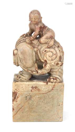 Soapstone sculpture of a Buddhist monk on an elephant