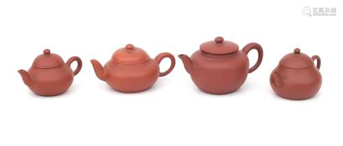 Four Chinese earthenware Yixing teapots, 19th century.