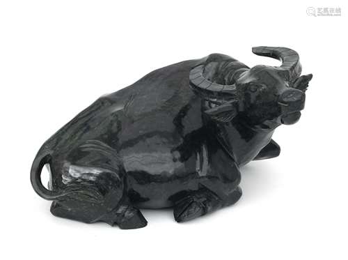 A green marble sculpture of a buffalo lying down, China, 20t...