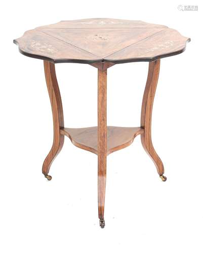 An Edwardian triangular walnut folding side table with intar...