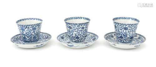 Three Chinese blue and white porcelain cups and saucers with...