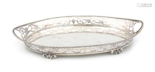 A 835 pierced silver oval tray with beaded border on support...