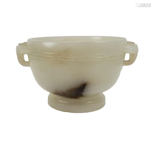A WHITE JADE TWO HANDLED CUP