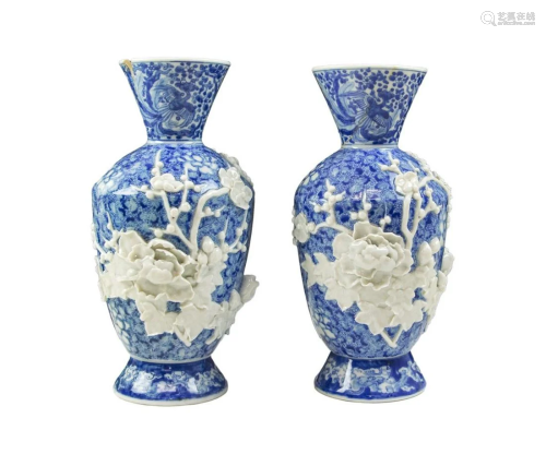PAIR OF JAPANESE BLUE AND WHITE RELIEF VASES