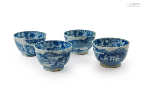 SET OF FOUR BLUE AND WHITE TEA CUPS