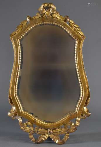 Miroir mouvementé en bois sculpté et doré XXe siècle, style ...