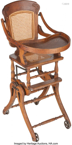 A Victorian Oak and Cane High Chair Stroller, la