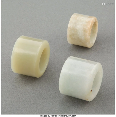 A Group of Three Celadon Jade Archer's Rings 1-1