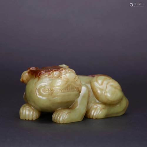 A CARVED YELLOW JADE PAPER WEIGHT