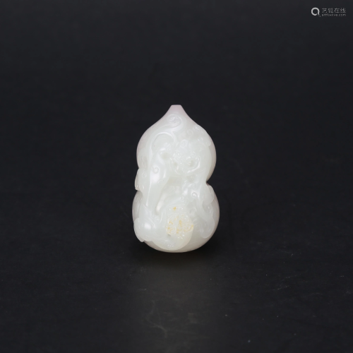 A CARVED WHITE JADE DOUBLE GOURD-SHAPED SEAL