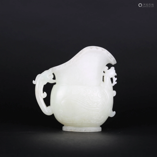 A CARVED WHITE JADE PHOENIX-SHAPED CUP