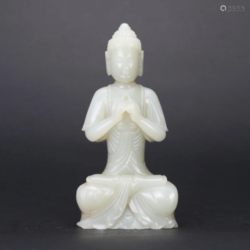 A FINELY CARVED FIGURE OF AMITABHA
