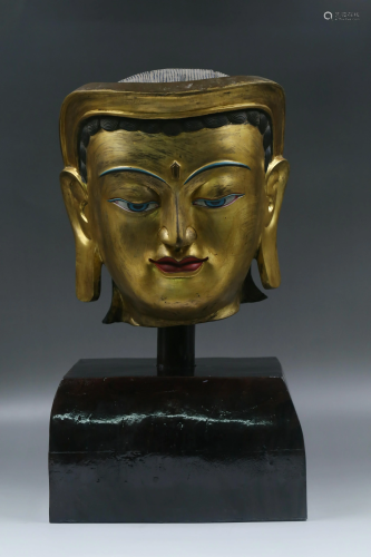 A Gilt Bronze Buddha Head