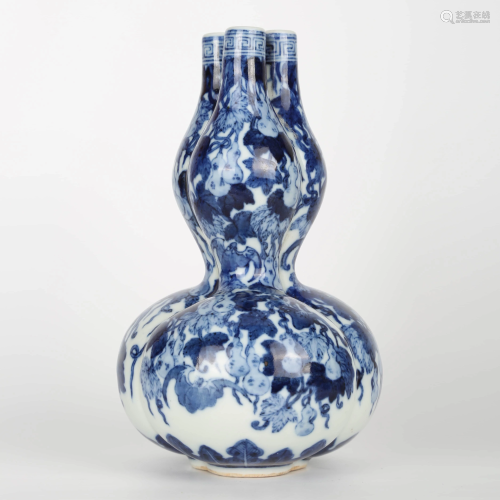 A BLUE AND WHITE GLAZE DOUBLE-GOURD VASE