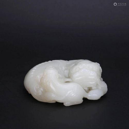 A CARVED WHITE JADE FIGURE OF BEAST