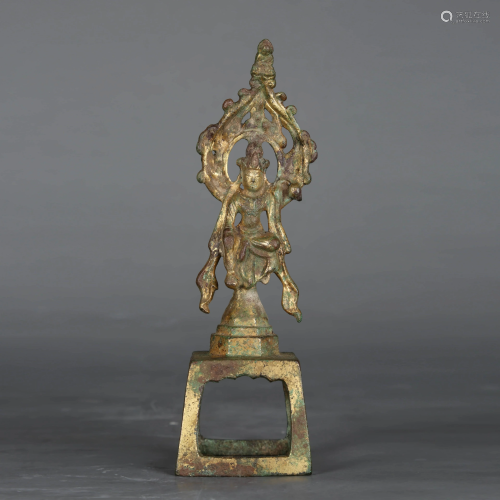 A GILT-BRONZE FIGURE OF BUDDHA WITH HALO AND SQUARE
