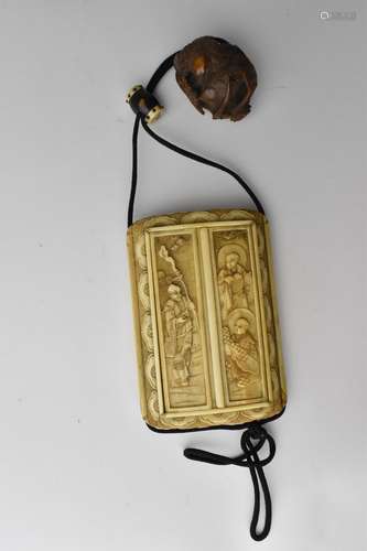 A Japanese Meiji period ivory inro shaped travelling shrine ...