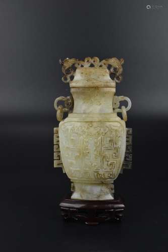 A Chinese Qing dynasty jade lidded vase of archaistic shape ...