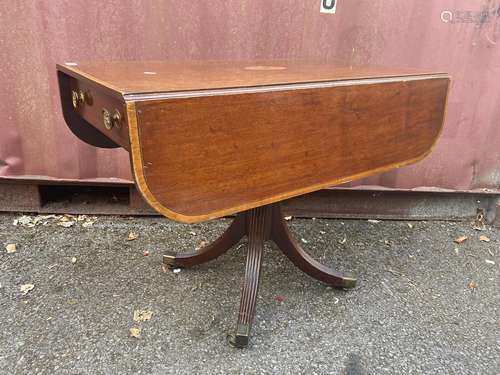 A Regency mahogany and marquetry Pembroke table, the top wit...