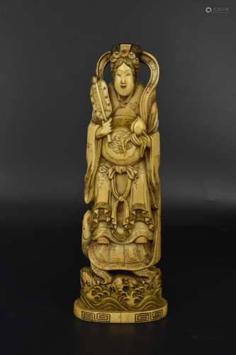 A Japanese Meiji period carved ivory okimono of the deity Xi...