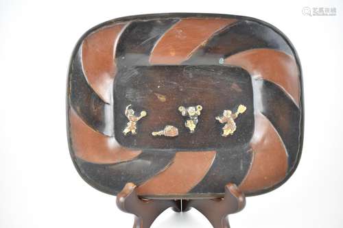 A Japanese Meiji/Taisho period patinated copper dish with a ...