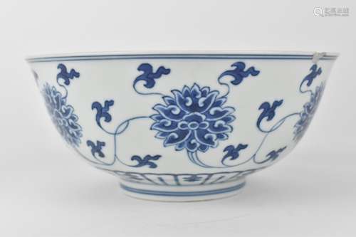 A Chinese Daoguang blue and white bowl with a central lotus ...