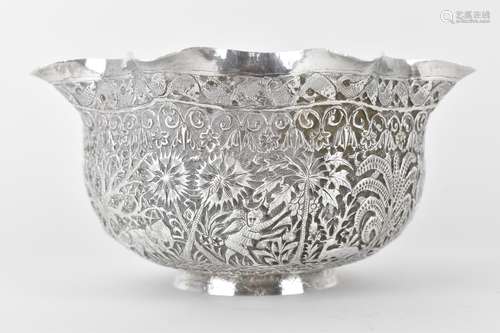 A 19th century Burmese silver bowl embossed and chased with ...