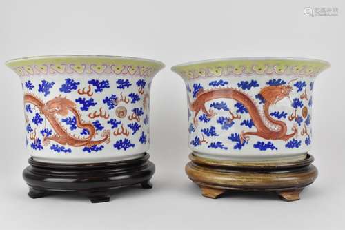 A near pair of Chinese 20th century cylinder jardinières wit...