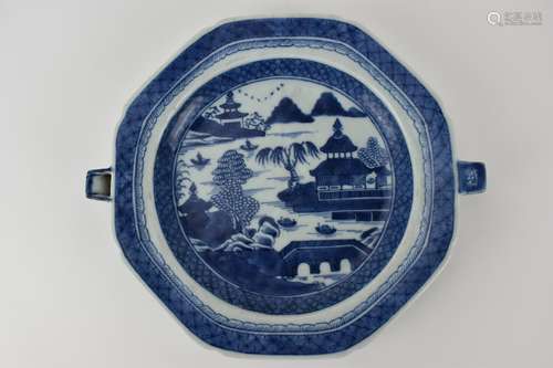 A Chinese late Qing dynasty blue and white hot water plate, ...