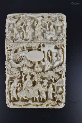 A late 19th century Cantonese carved ivory card case, intric...