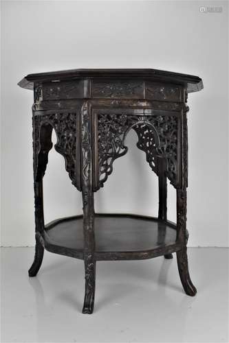 A late 19th century Chinese rosewood decagonal table, with a...