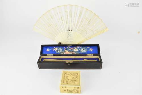 A 19th century Chinese Canton fan, the ivory guards carved w...