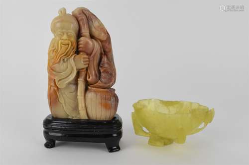 A Chinese yellow/pale green jade bowl, fashioned as a leaf a...