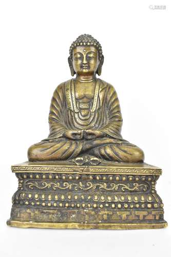 A Sino-Tibetan lacquered bronze or brass statue of Buddha in...