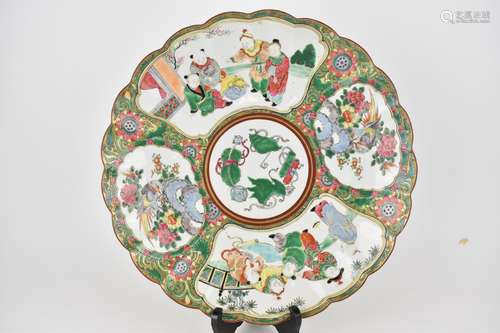 A late Qing dynasty polychrome enamel charger with a wavy ed...