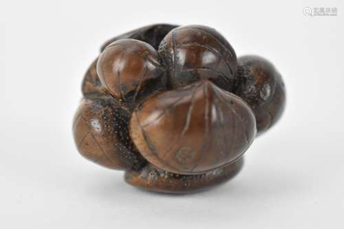 A Japanese Edo period 18th/19th century wooden netsuke of a ...