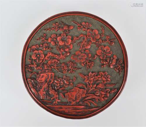 A Chinese Qing dynasty carved cinnabar lacquer box, of cylin...