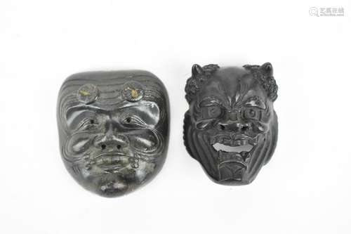 Two Japanese Meiji period patinated bronze Noh masks modelle...