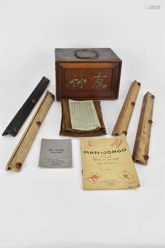 An early 20th century Chinese bamboo and bone Mah Jong set c...