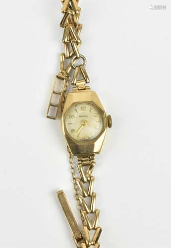 A 9ct gold Audax ladies wristwatch on a 9ct gold bracelet wi...