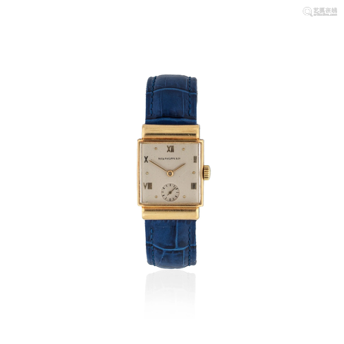 Patek Philippe. An 18K gold manual wind rectangular