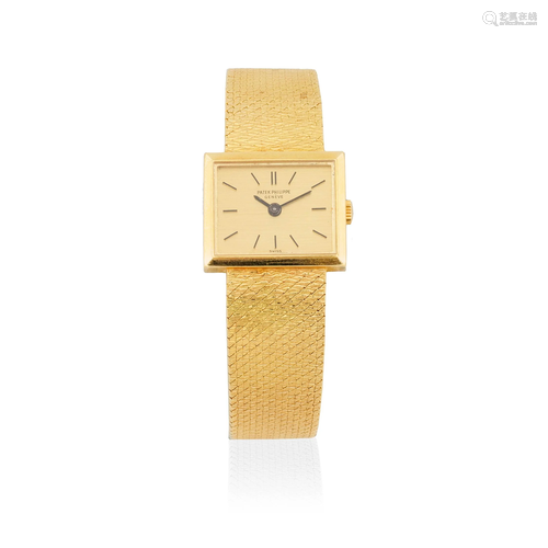 Patek Philippe. A lady's 18K gold manual wind bracelet