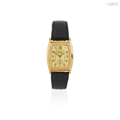 Rolex. A gilt metal manual wind tonneau form wristwatch